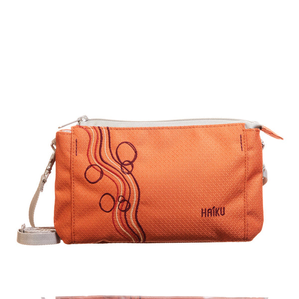 Haiku Stride Wristlet in Wild Mint, Rustic Clay & River Rock Blue