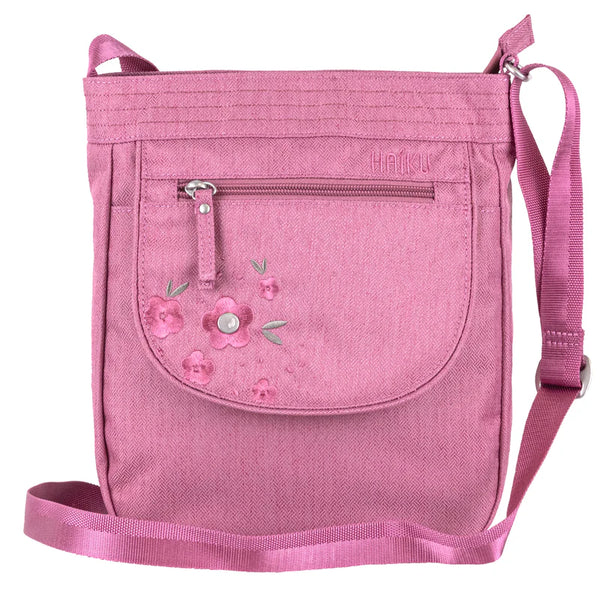 Haiku Jaunt Cross Body Bag in Cherry Blossom, River Rock Blue, Black in Bloom and  Forest