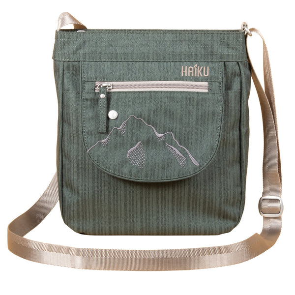 Haiku Jaunt Cross Body Bag in Cherry Blossom, River Rock Blue, Black in Bloom and  Forest